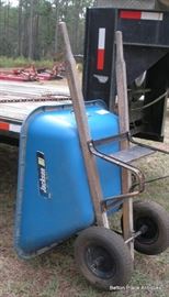 there are TWO blue wheelbarrows, both have the double wheel at front