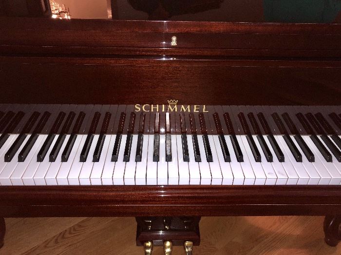 Gorgeous Schimmel Mahogany Chippendale 5'10" Grand Piano - Model 174C - SN 260.006. Built in Germany in 1987 and delivered to this home the same year. This piano is in absolutely mint condition.