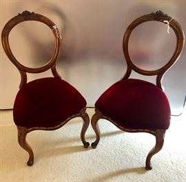 Two antique Victorian backless chairs.