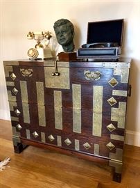 Fall-Front Korean bandaji, or blanket chest, with a drop-down front covered in highly ornate brass plating and hardware