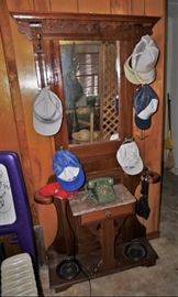 Antique hall tree with marble top and umbrella drip pans