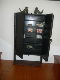 antique metal cabinet with wooden base