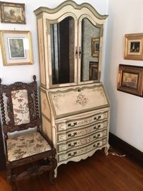 This lovely hand painted cabinet, opens to a desk. This would be perfect for a girl's room!