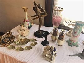 Fabulous Erte sculpture surrounded by a fine assortment of antique porcelain
