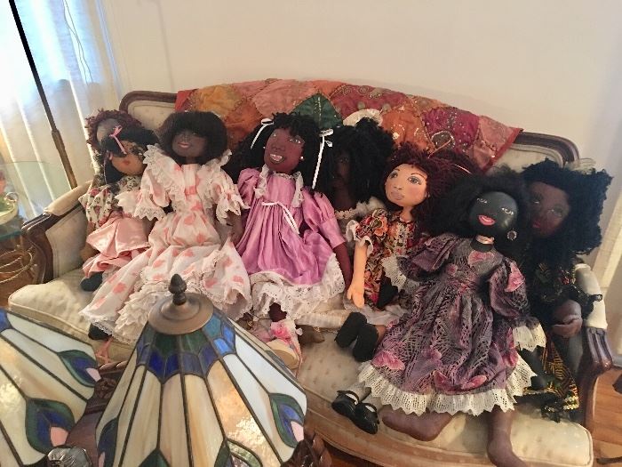 A whimsical assortment of hand made dolls