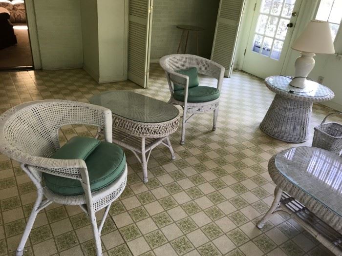 #31 white wicker end table oval 30x18x19 $35.00 
#32 (2) white wicker chairs w green cushions $35 ea $70.00 
#34 white wicker round end table w solid cone bottom $45.00