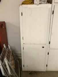#68 white painted wood storage cabine w 1 long doors 23x18x60 $65.00
