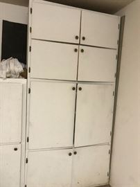 #69 white painted wood storage cabinet w 8 doors 48x18x92 $120.00