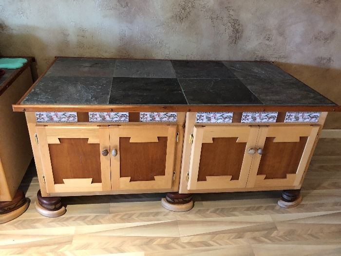 custom designed cabinets, Southwestern tiles, slate top