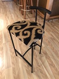 total of 5 counter stools, fabric seats and wrought iron backs, legs