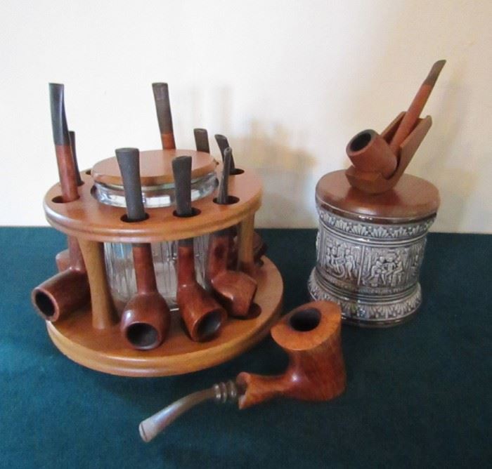 Collection of pipes and holders