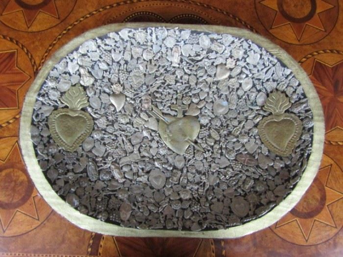 Bowl encrusted with silver medallions from Mexico