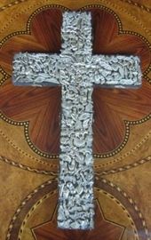 Wood cross encrusted with silver medallions from Mexico