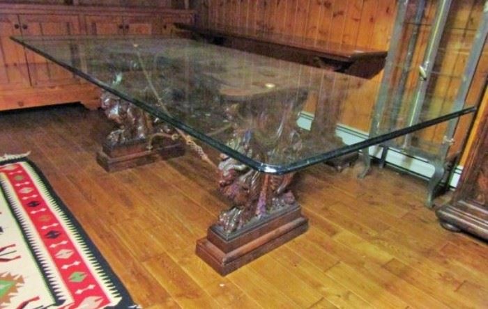 Dining table with wood base and glass top