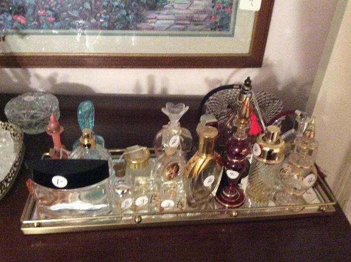 Minature and regular perfume bottles - great collection.