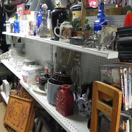 Many collectible glass items and home decor items. 