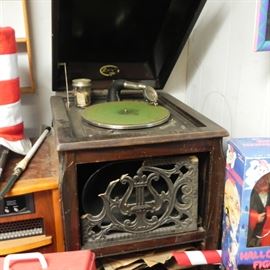 A vintage record player. It's the wind up kind and it still works. Comes with lots of records to boot. 
