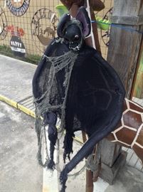 Hanging Bat Ghost; Bendable Arms; Gauze Wrapping
Styrofoam Skull; About 4' Wingspan; $5