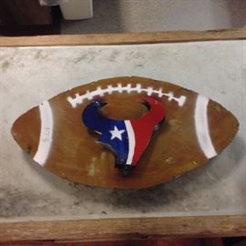 Texans Metal Football; Meant for Outdoor Use; Hand-Made in Mexico; 3 Available; 22"W x 2"D x 12"H; $24; ref #: 911