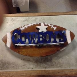 Dallas Cowboys Metal Football; Meant for Outdoor Use; Hand-Made in Mexico; 3 Available; 22"W x 2"D x 12"H; $24; ref #: 911