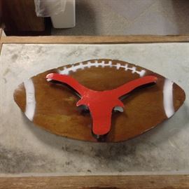 Texas Longhorns Metal Football; Meant for Outdoor Use; Hand-Made in Mexico; 3 Available; 22"W x 2"D x 12"H; $24; ref #: 911