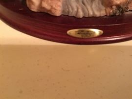 Inscription plate on angel figurine