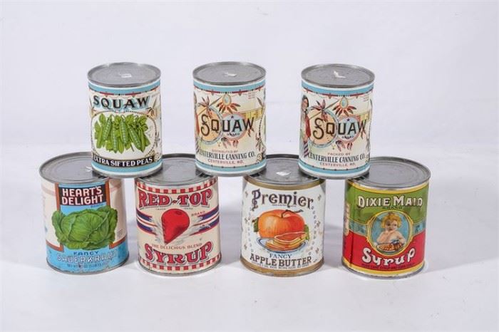 36. Lot of Seven 7 Prop Tin Cans