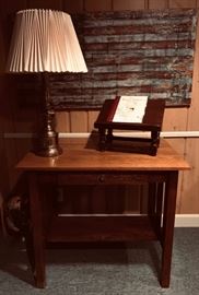 Vintage oak desk in Mission style. Used. Good condition. One mark on surface. Sturdy and solid. Nice small size. Length 34", Width 24", Height 30". Lamp, accessories not included.