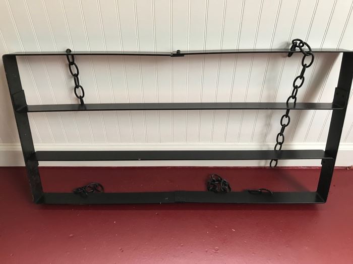 Black Pan Rack. To hang from ceiling or soffit to hold kitchen pans. 