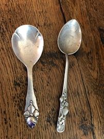 silver spoon ware with elegant designs.