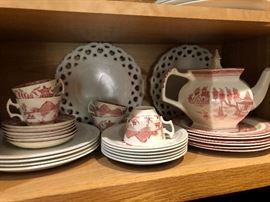 Transfer ware with cups, saucers, plates.