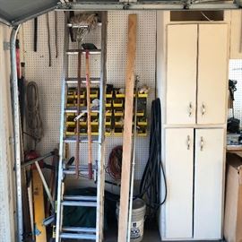 Garage is loaded with tools, ladders, hand tools, power tools, power washers, compressor, air tools. 