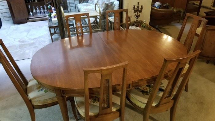 Dining room table - comes with 2 leaves and seats 8 people total. The chairs are a really beautiful hand-stitched floral design.