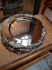 Silver plate chargers.