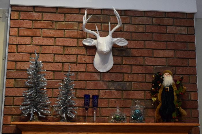 Nothing says, "Merry Christmas" quite like a paper mache deer trophy!