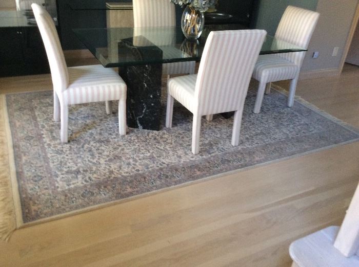 Art deco glass and stone dinning room table, 6 pink and white dinning room chairs. 