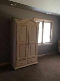 Solid wood armoire/entertainment center. 