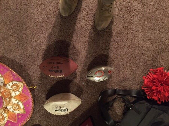 Authentic Signed foot balls .