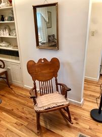 Antique rocker and mirror.