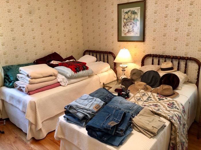 Vintage blankets and comforters, vintage men's hats.