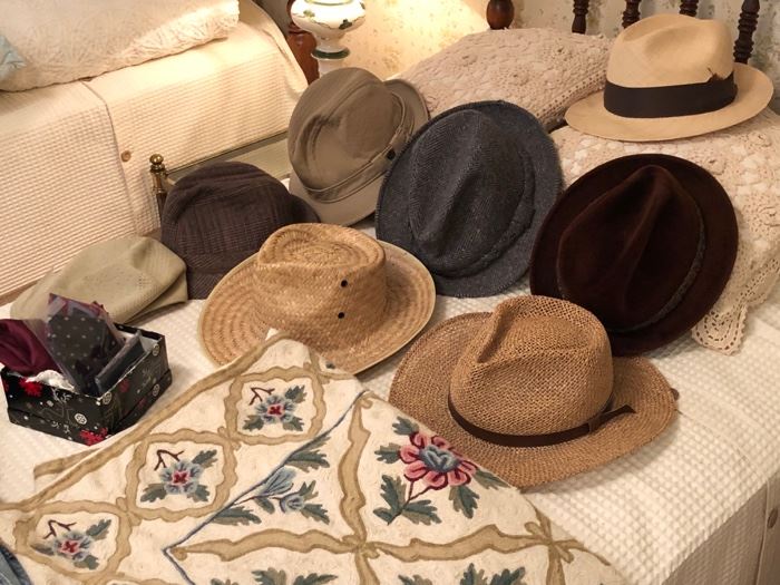 Mens vintage hats and a pretty wool rug.