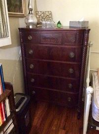 vintage dresser with brass accents and barley twist