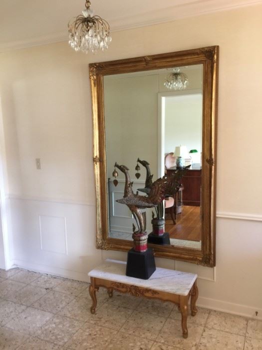 Entry Table, mirror, statue & small crystal light fixture