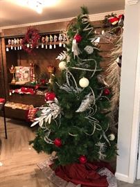 Gorgeous Christmas Tree, sparkling nutcrackers, vintage linens, greenery