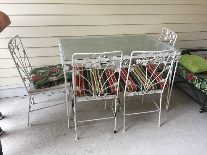 #62	Metal/Glass Top Table w/4 chairs  48x30x31	 $75.00 
