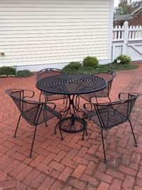 #72	Wrought Iron Table w/4 chairs  42round	 $125.00 
