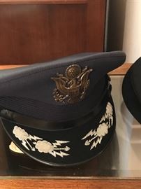 Lots of medals, uniform and caps 