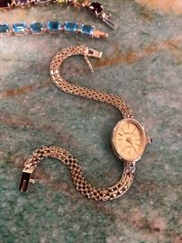 Solid 14 k gold Geneva watch and band