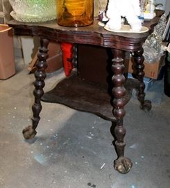 Antique glass claw-and-ball foot table