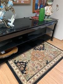 Large Black glass entertainment console.